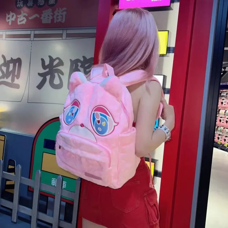 Mochila de osito de graduación.